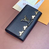  Refined top-handle bag carried on shoulder