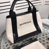 Front view of modern everyday-luxe women's handbag – women's statement bag