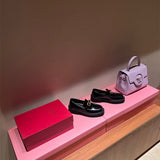 Side profile view of Valentino Garavani luxury piece style No.185