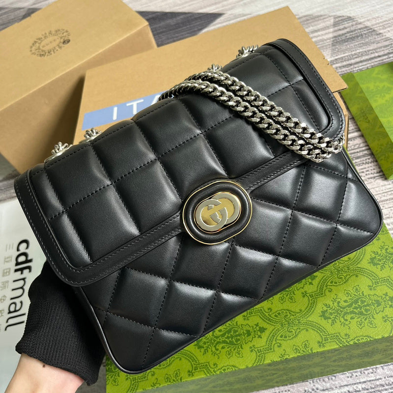 Side profile of statement refined women's handbag – women's statement bag