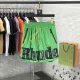 Front view of Rhude luxury clothing with monogram-inspired silhouette