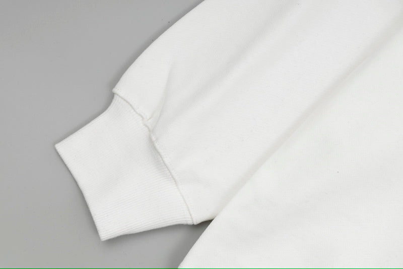 Side profile of Louis Vuitton luxury clothing with signature branding