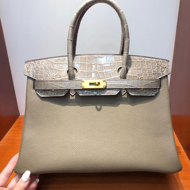Side view of modernist structured handbag