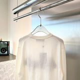Side profile of Louis Vuitton luxury clothing with monogram-inspired silhouette