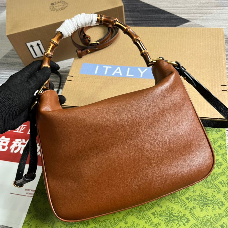 Handle and strap detail of chic everyday-luxe women's handbag – women's luxury handbag