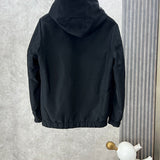 Side profile of Louis Vuitton luxury clothing with label-forward styling