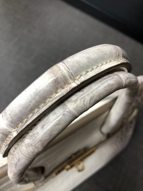 Side view of modernist structured handbag