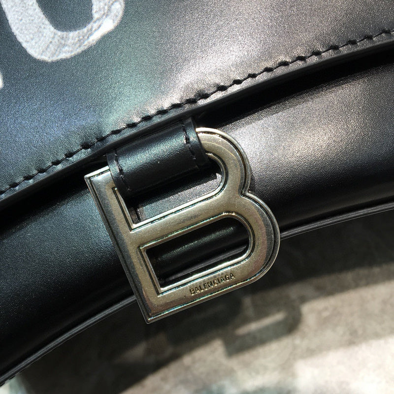 Sleek Faux Leather Handbag - Statement Silhouette | Women's Premium Handbag #630 - styled full view (image 7) of designer-inspired handbag
