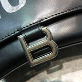 Sleek Faux Leather Handbag - Statement Silhouette | Women's Premium Handbag #630 - styled full view (image 7) of designer-inspired handbag