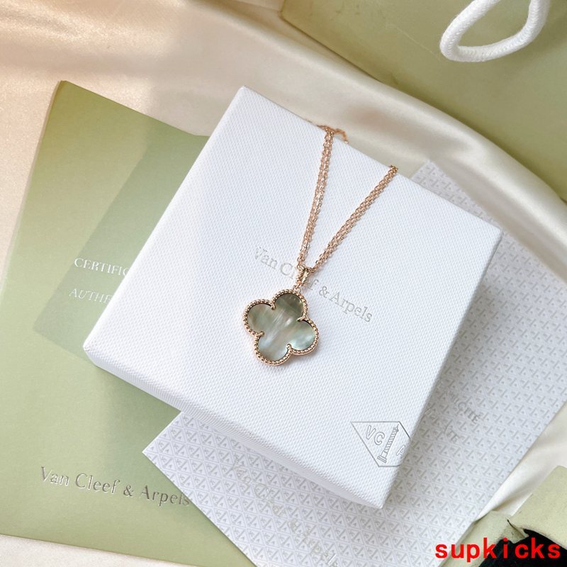 Lifestyle view of Van Cleef & Arpels unisex jewelry piece