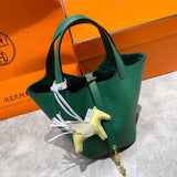 Side view of streamlined structured handbag