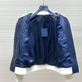 Front view of Louis Vuitton luxury clothing with label-forward styling