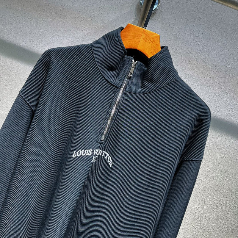 Close-up detail shot of Louis Vuitton luxury clothing with monogram-inspired silhouette