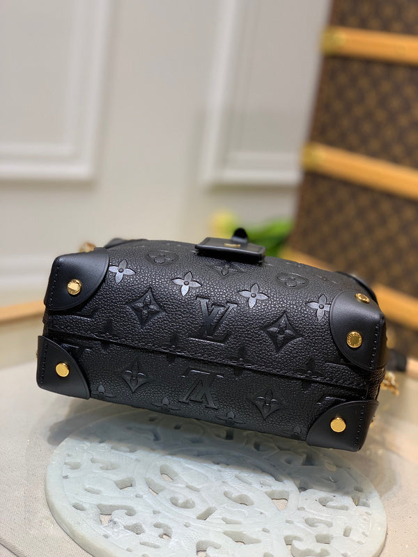 Styled lifestyle shot of elevated classic women's handbag – women's statement bag