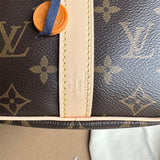  Understated satchel carried on shoulder