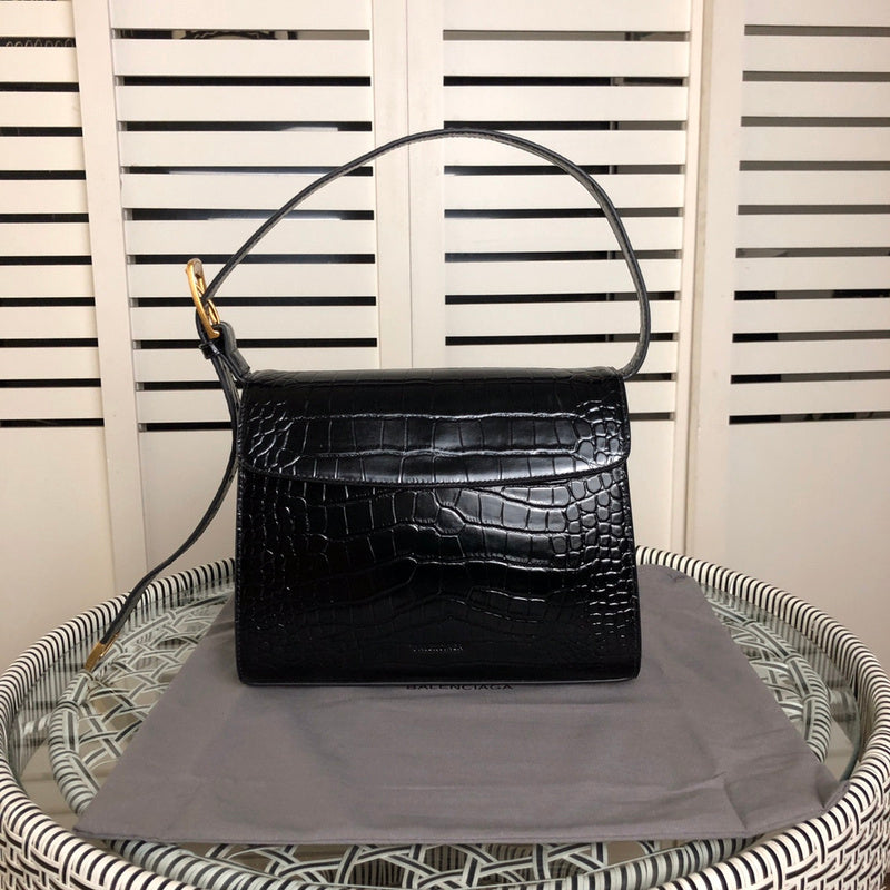 Side profile of modern refined women's handbag – women's luxury handbag