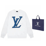 Close-up detail shot of Louis Vuitton luxury clothing with signature branding