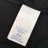 Flat lay presentation of Louis Vuitton cotton t-shirt with signature branding