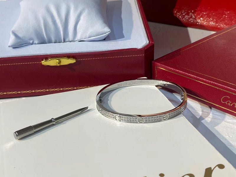 Side view of Cartier unisex jewelry piece