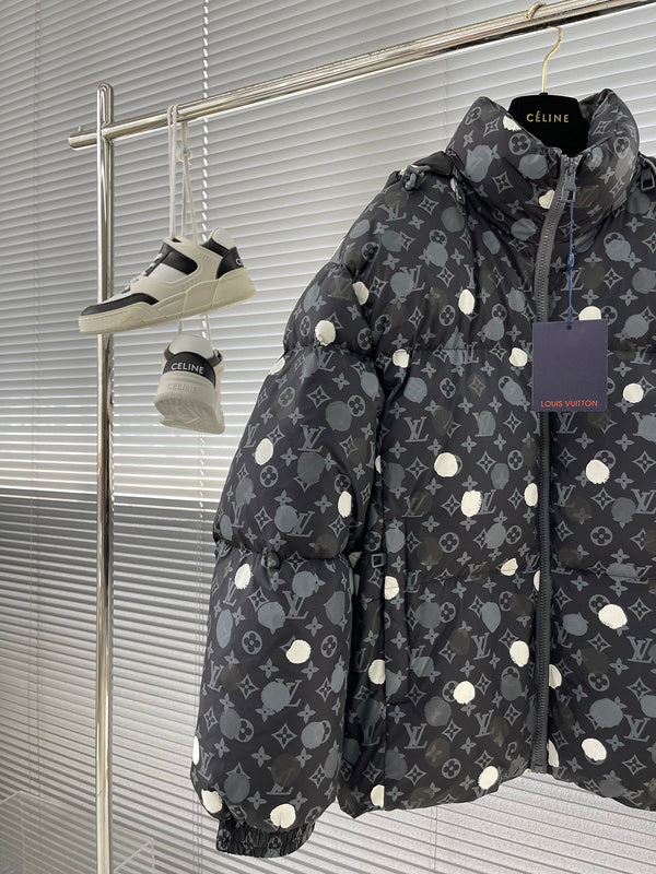 Close-up detail shot of Louis Vuitton luxury clothing with logo-detail design