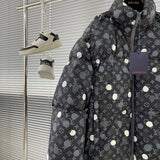Close-up detail shot of Louis Vuitton luxury clothing with logo-detail design