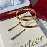 Front view of Cartier unisex jewelry piece