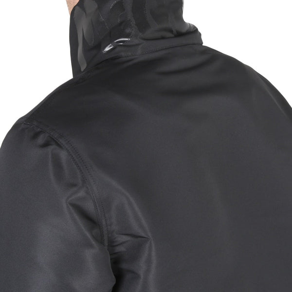 Close-up of Alexander McQueen jackets hardware and fine stitching