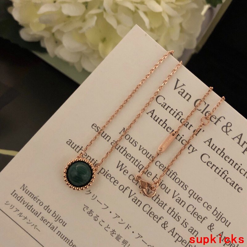 Lifestyle view of Van Cleef & Arpels unisex jewelry piece