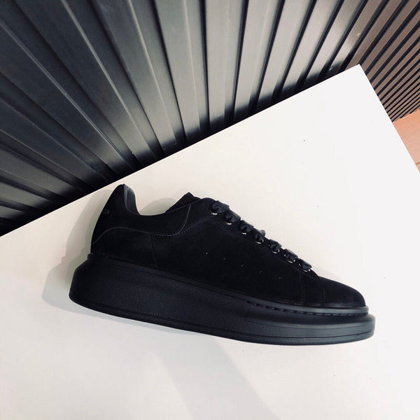 Alexander McQueen sneakers detailed view showing premium designer craftsmanship