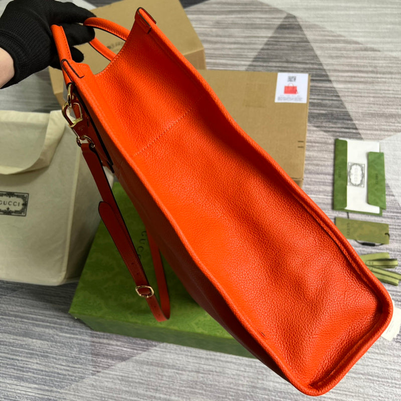 Handle and strap detail of refined structured women's handbag – women's statement bag