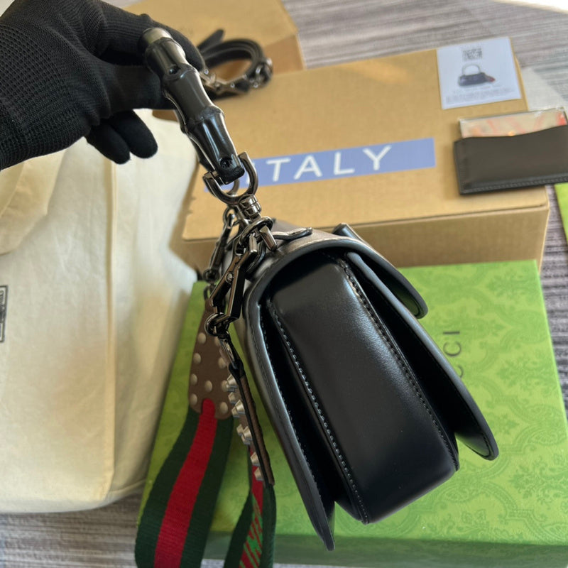 Side view of streamlined structured handbag