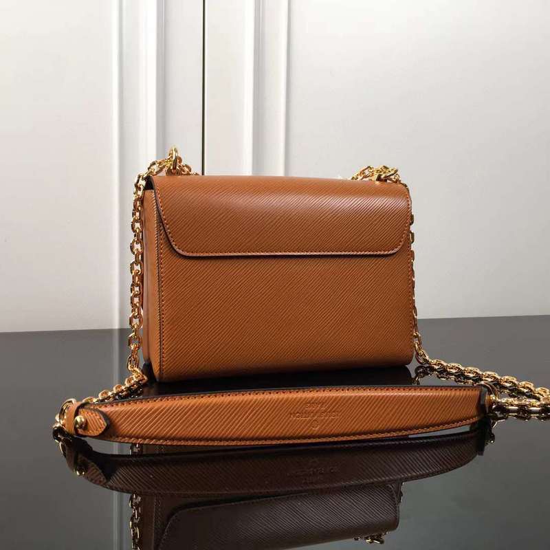 Styled lifestyle shot of sleek chic women's handbag – women's luxury handbag