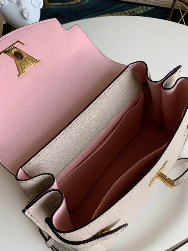 Back view of modern sleek women's handbag – women's statement bag