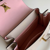 Back view of modern sleek women's handbag – women's statement bag