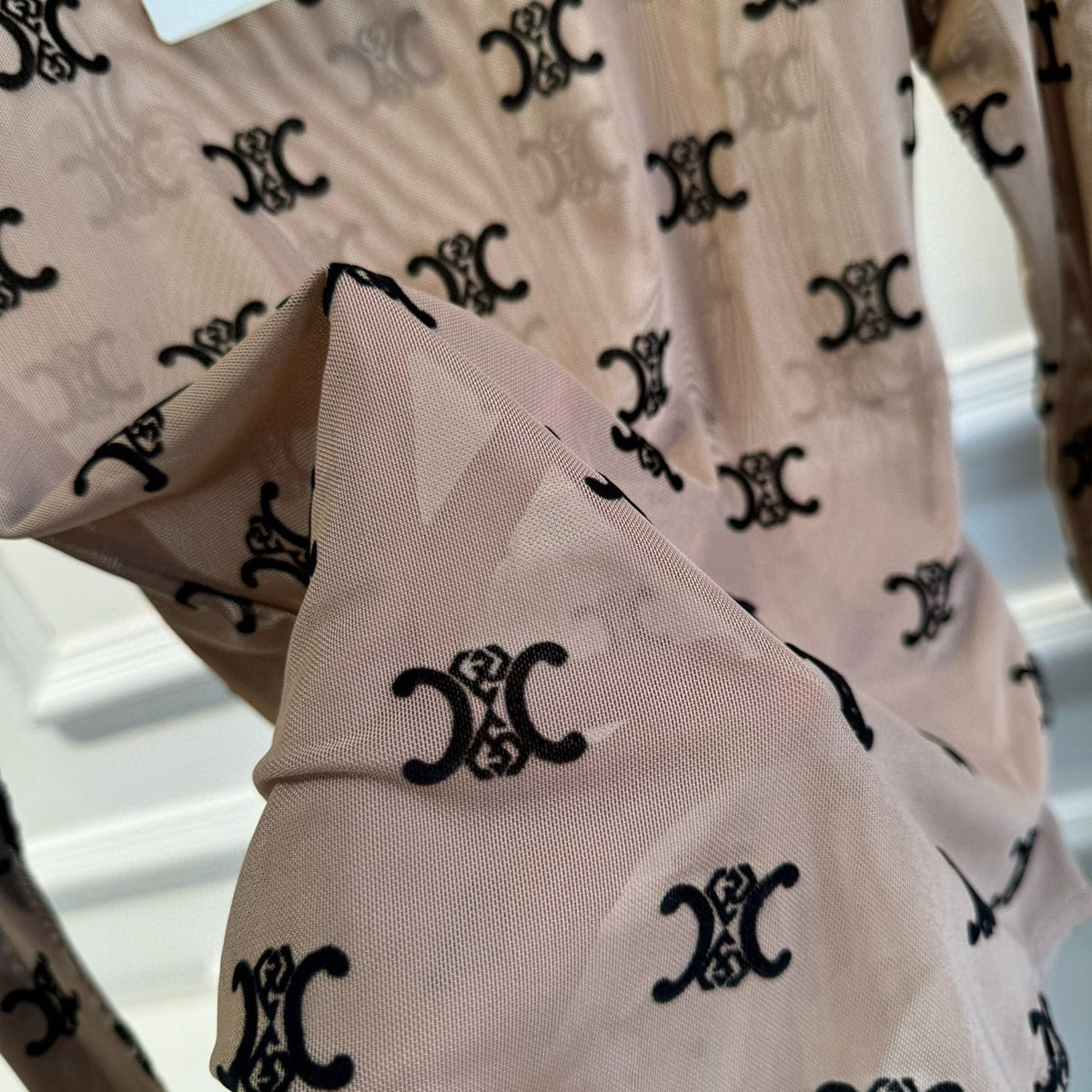 Celine Bodysuit detail shot – designer craftsmanship and quality