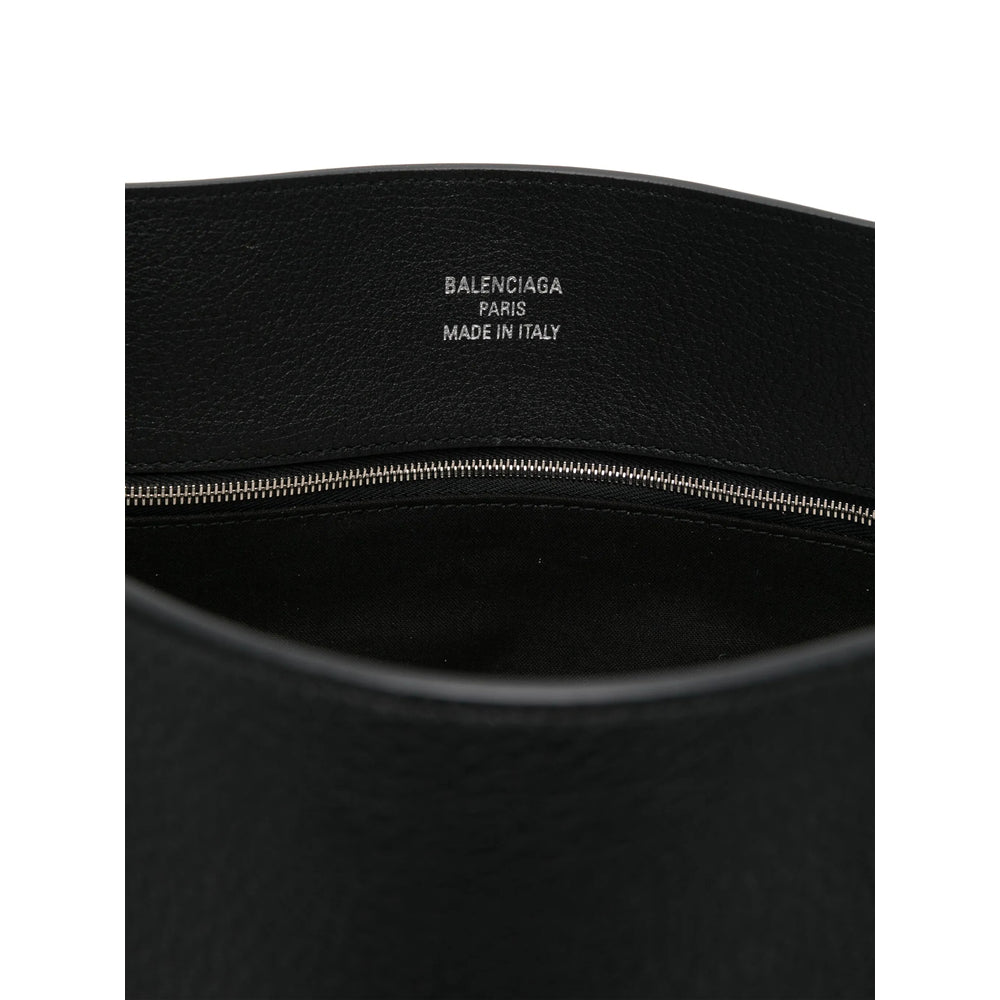 Close-up of Balenciaga cross body bags hardware and fine stitching