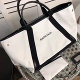 Styled lifestyle shot of elevated chic women's handbag – women's premium purse
