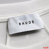 Close-up detail shot of Rhude luxury clothing with contemporary cut