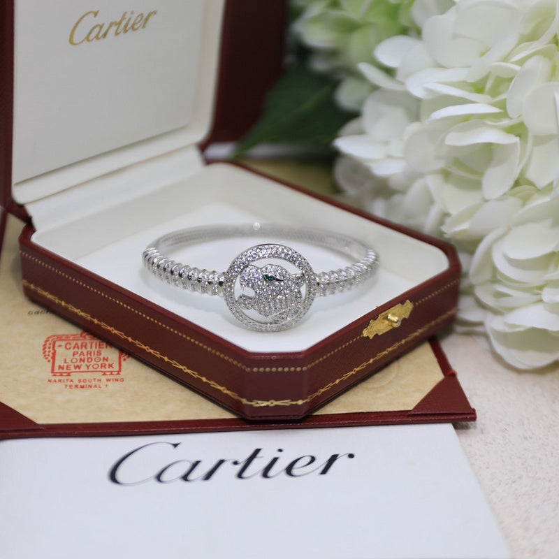 Angled view of Cartier unisex jewelry piece