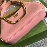 Back view of statement signature women's handbag – women's luxury accessory