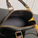 Interior view of statement classic women's handbag – women's luxury accessory