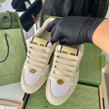 Gucci two-tone luxury sneakers view 4 signature lace-up style