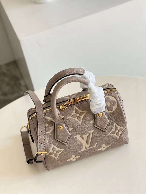 Handle and strap detail of elevated statement women's handbag – women's designer-style accessory