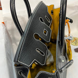 Side view of refined structured handbag