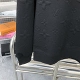 Back view of Louis Vuitton luxury clothing with runway-inspired design