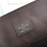 Side profile of classic refined women's handbag – women's luxury handbag