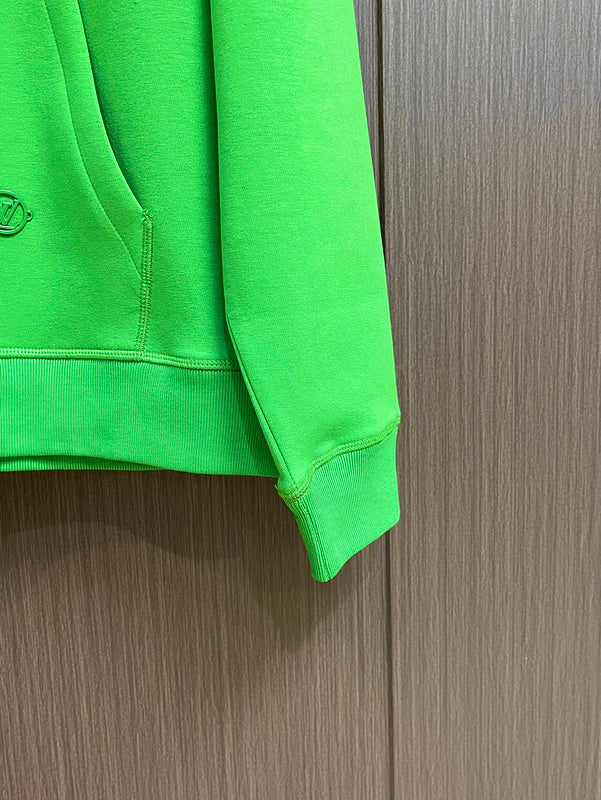 Side profile of Louis Vuitton luxury clothing with logo-detail design