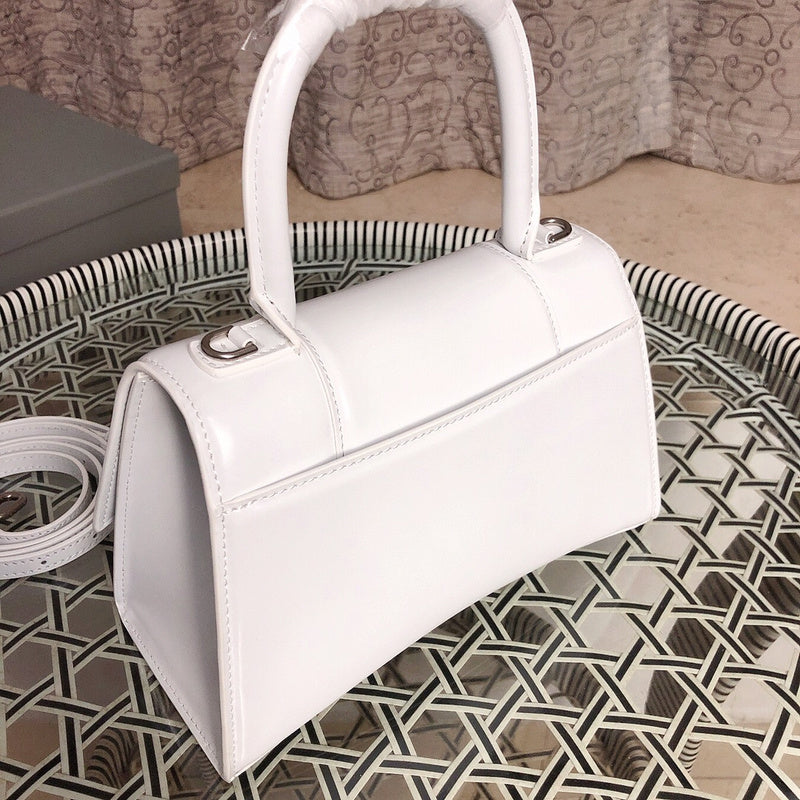 Side profile of premium refined women's handbag – women's statement bag