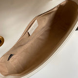 Close-up detail of elevated refined women's handbag – women's statement bag