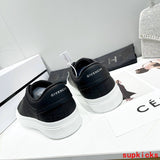 Givenchy Red Low-Top Sneakers - Close-Up Texture View